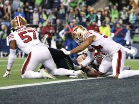 Jacob Hollister of the Seattle Seahawks is stopped short of the goal line to turn the ball over on fourth down against the San Francisco 49ers in the fourth quarter during their game at CenturyLink Field on Dec. 29, 2019 in Seattle, Washington.