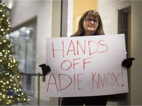 Caroline Taylor, a resident of Ward 2 and delegate at city council Monday night, brought a sign showing her opposition to a recommendation in the city's proposed recreation master plan to close the pool at Adie Knox Herman Recreation Complex.