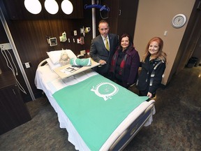 The In Honour of the Ones We Love organization donated fleecy blankets to patients in the palliative care unit of Hotel Dieu Grace Healthcare on Monday, December 2, 2019. The blanket program started at the request from patients for a warm and cozy blanket which they would use and bring home with them. Bill Marra, Vice President of Hotel-Dieu Grace Healthcare for External Affairs is shown with Anita Imperioli, centre, and Teresa Silvestri from the In Honour of the Ones We Love organization.