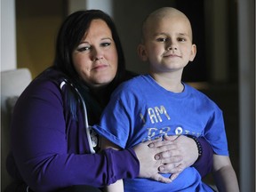Brock Hasson, 10, who is battling cancer for the third time is shown with his mom Natalie Brundage-Hasson at their Amherstburg, ON. home on Thursday, December 19, 2019.