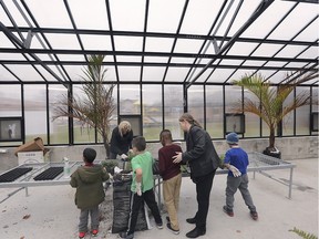 Young clients of the Hotel-Dieu Grace Healthcare Regional Children's Centre are shown with teachers Katy Heath, left, and Jordan Butcher in the organization's greenhouse on Monday, December 2, 2019. The greenhouse funded in part by the Rotary Club of Windsor-St. Clair provides children the opportunity to explore and observe how plants develop and grow.