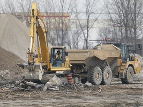 Major cleanup work has begun on the parcel of land near the WFCU Centre that will eventually be the site of a $250-million residential development. Heavy equipment operators are shown on Tuesday, December 10, 2019, at the site of the former General Motors plant.