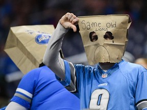Detroit Lions fans with bags on their face during the game against the Tampa Bay Buccaneers at Ford Field.