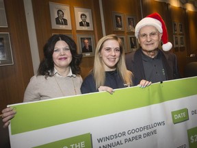 St. Clair College president, Patti France, Chelsea Derenski, president of Protections, Security and Investigation/Police Foundations Society, and Gilbert Barrichello, president of Windsor Goodfellows, pose with a cheque for $28,600 from St. Clair College to Windsor Goodfellows, Tuesday, Dec. 10, 2019.  Students from PSI/Police Foundations Society as well as Border Service Society raised a total of $14,300 that was then matched by the college.