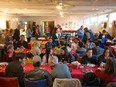 Attendees of Green Bean Cafe's free community holiday dinner on Dec. 25, 2016.