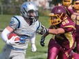 Ethan MacKinnon, left, of Villanova slips past the reach of Aly Abdelsalam of Catholic Central during their game on Sept. 20, 2018 in LaSalle.