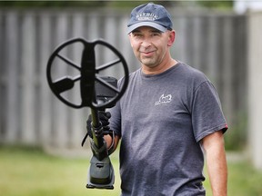 Jack Lewis, a member of the Sunparlour Treasure Seekers is shown with his metal detector in this file photo from 2018.