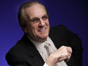 In this Oct. 7, 2011, file photo, actor Danny Aiello smiles while being photographed in New York. Aiello, the blue-collar character actor whose long career playing tough guys included roles in "Fort Apache, the Bronx,"  "The Godfather, Part II," "Once Upon a Time in America" and his Oscar-nominated performance as a pizza man in Spike Lee's "Do the Right Thing," has died. He was 86. Aiello died Dec. 12, 2019, after a brief illness, said his publicist, Tracey Miller.