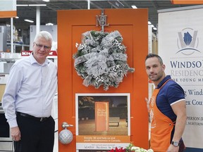 The Windsor Residence for Young Men organization is benefiting from the Home Depot Orange Door campaign. From December 3-22, the Walker and Division Rd. store will be asking customers to donate $2 towards the local charity. David Freeman, left, director of fundraising for the Windsor Residence for Young Men is shown with Home Depot store manager Mark Belanger on Wednesday, December 4, 2019.