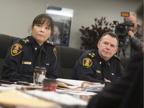 Windsor police chief Pam Mizuno, left, and deputy chief, Brad Hill, attend a Windsor Police Services Board meeting, Monday, Dec. 9, 2019.