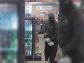 A security camera image of an armed robber at the Circle K at 3803 Walker Rd. in Windsor on the night of Dec. 28, 2019.