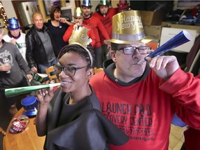 The Launch Pad Recovery Center is preparing to celebrate their second New Year's Eve Sober party. Maxine Shelton, president, John Button, director of programming, front, and members of the organization have some fun getting ready for the event on Thursday, December 12, 2019, at the Drouillard Rd. location.