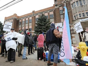 Secondary school teachers and supporters picket outside Walkerville Collegiate Institute in Windsor on Dec. 4, 2019. Members of OSSTF embarked on a one-day strike in protest of government cuts in education.