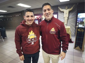 Turki Ayash, left, a Catholic Central High School Grade 11 student is shown with Jalil Khoury, department head of physical education on Wednesday. Ayash recently performed CPR on his father and saved his life after learning the skill at school from Khoury.