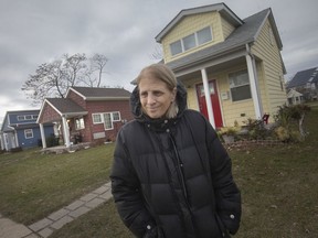 Rev. Faith Fowler, executive director of Cass Community Social Services, is pictured in front of the tiny homes the agency has built for low income residents in the Dexter Linwood neighbourhood of Detroit, Friday, Nov. 22, 2019.