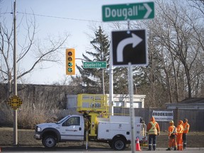 WINDSOR, ONT:. DECEMBER 19, 2019 -- New traffic lights are installed at the intersection of Dougall Avenue and Ouellette Place, Thursday, Dec. 19, 2019.