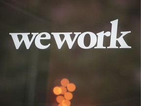 A sign marks the location of a WeWork office facility on August 14, 2019 in Chicago, Illinois. WeWork, a real estate firm that leases shared office space, announced today that it had filed a financial prospectus with regulators to become a publicly traded company.