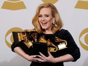 Singer Adele, winner of the GRAMMYs for Record of the Year for "Rolling In The Deep", Album of the Year for "21", Song of the Year for "Rolling In The Deep", Best Pop Solo Performance for "Someone Like You", Best Pop Vocal Album for "21" and Best Short Form Music Video for "Rolling In The Deep", poses in the press room at the 54th Annual GRAMMY Awards at Staples Center on February 12, 2012 in Los Angeles, California. (Photo by Kevork Djansezian/Getty Images)