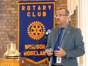 Dr. Wajid Ahmed, medical officer of health, speaks about overdose related morbidity and morality in Windsor-Essex durng a visit to Rotary Windsor-Roseland luncheon at Fogolar Furlan Club Tuesday. .