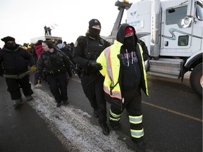 Regina police arrest Tecumseh resident Ken Anderson, skilled trades chairperson for Unifor Local 200 at the Ford Motor Co., on Monday after officers were called to the picket line on day 46 of the lockout by Federated Co-operatives Limited in Regina.