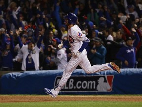 Kris Bryant of the Chicago Cubs rounds the bases after hitting a home run in the fourth inning against the Cleveland Indians in Game Five of the 2016 World Series at Wrigley Field on Oct. 30, 2016 in Chicago, Illinois.