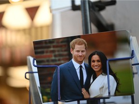 Royal memorabilia featuring Britain's Prince Harry, Duke of Sussex, and Meghan, Duchess of Sussex, is displayed for sale in a store near Buckingham Palace in London on Jan. 10, 2020.