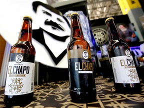 Bottles of beer of "El Chapo 701," a line in clothing, jewelry and liquor bearing the nickname of the jailed Mexican drug lord Joaquin "El Chapo" Guzman Loera, are displayed during the 72 edition of IM Intermoda Mexico fashion fair in Guadalajara, Mexico, on Jan. 14, 2020. (ULISES RUIZ/AFP via Getty Images)