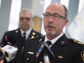 Essex-Windsor EMS Chief Bruce Krauter, right, is joined by Essex Fire and Rescue Chief Rick Arnel in January during a news conference at the Essex County Civic and Education Centre.