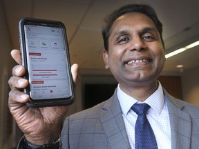 Windsor-Essex Regional Chamber of Commerce president and CEO Rakesh Naidu displays the new AyeWork mobile app he created to connect employers and job seekers, on Friday, January 17, 2020, at the Unemployed Help Centre in Windsor.