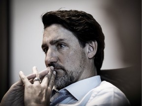 Canada's Prime Minister Justin Trudeau, featuring a beard after his vacation in Costa Rica, meets with ministers and officials during an update on the Middle East in Ottawa, Ontario, Canada January 6, 2020. Picture taken January 6, 2020.
