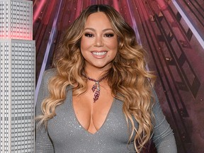 Mariah Carey lights the Empire State Building in celebration of the 25th anniversary of "All I Want For Christmas Is You" at the Empire State Building on Dec. 17, 2019, in New York City.