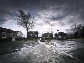 Cottages along Erie Shore Drive in Chatham-Kent get pounded by high wind and waves on Wednesday, November 27, 2019. (DAN JANISSE/Postmedia Network)