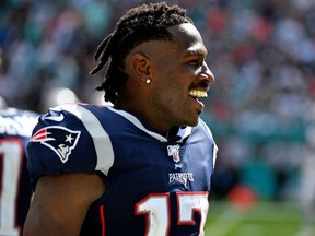 New England Patriots wide receiver Antonio Brown looks on during the second half against the Miami Dolphins at Hard Rock Stadium.