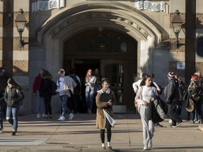 In this Jan. 6, 2020, file photo, students exit Walkerville Collegiate Institute at the end of classes on a Monday.