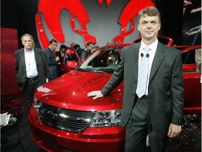 Michael Manley, Chrysler Group International Executive Vice-President, poses next to a new Chrysler Dodge Journey car during the press day for the 62nd International Motor Show (IAA), 11 September 2007 in Frankfurt/Main. The fair will be open for the public from 13 to 23 September 2007.