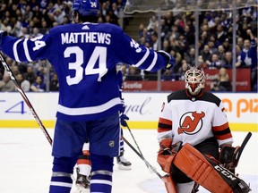 New Jersey Devils goaltender Louis Domingue (70) reacts after getting scored on by Toronto Maple Leafs centre Auston Matthews (34) during second period NHL hockey action in Toronto, Jan. 14, 2019. Matthews scored a hat trick in the game.