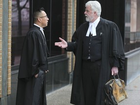 WINDSOR, ON. JANUARY 10, 2020 -- Martin Park, left, a federal prosecutor speaks with lawyer Andrew Bradie on Friday, January 10, 2020, outside of the Superior Court in Windsor, ON. Bradie was defending Jon-Paul Fuller, former head of Crime Stoppers, charged in a large drug bust.