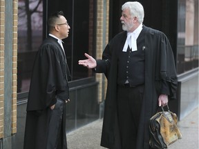 Martin Park, left, a federal prosecutor, speaks with lawyer Andrew Bradie on Friday, Jan. 10, 2020, outside the Superior Court building in downtown Windsor. Bradie is defence lawyer for Jon-Paul Fuller, former local head of Crime Stoppers, charged in a large drug bust.