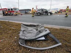 The door of a heavily-damaged Dodge Journey at the intersection of Lauzon Parkway and Forest Glade Drive on Jan. 4, 2020.