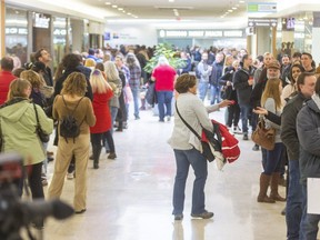 A lineup of thousands formed in St. Thomas as locals sought to be cast as extras in an Apple TV series starring Jason Momoa, parts of which will be filmed at the former psychiatric hospital just outside St. Thomas. Pauline Westelaken of London is shown here walking back through the crowd to hand over a measuring tape so other people can put their measurements on their application sheets. Photograph taken on Tuesday January 21, 2020. (Mike Hensen/The London Free Press)