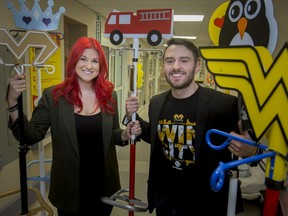 Iain and Chantelle, of the Fight Like Mason Foundation, are pictured with several IV poles, dubbed Mason's Power Poles, that were donated to Erie Shores Healthcare, Monday, January 20, 2020.