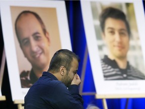 A man becomes overwhelmed by emotion at a memorial service for five University of Windsor community members who were killed when PS752, a civilian airliner, was shot down by the Iranian military on Jan. 8, 2020. Photographed at a memorial service on the University of Windsor campus on Jan. 10, 2020.