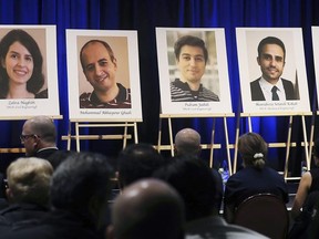 Photos of the five people killed in a plane crash in Iran Wednesday: Zahra Naghibi, Mohammad Abbaspour Ghadi, Pedram Jadidi, Hamidreza Setareh Kokab and Samira Bashiri, are shown during a memorial service at the University of Windsor on Friday.