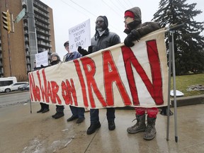 Members of the Windsor Peace Coalition participate in a "No War With Iran" rally on Jan. 25, 2020, at Tecumseh and Ouellette in Windsor, ON.
