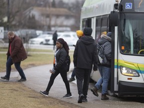 'Obvious' need for improvements. Passengers are shown Jan. 13, 2020, exiting and boarding a Transit Windsor bus outside St. Clair College's South Windsor campus.