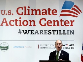 Still in. In this Dec. 10, 2019, file photo, U.S. presidential hopeful Michael Bloomberg is shown speaking at the U.N. Climate Change Conference (COP25) in Madrid, Spain.