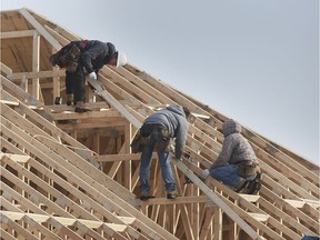 Construction workers frame a house on Wednesday, January 22, 2020 on Mountbatten Crescent in Windsor.