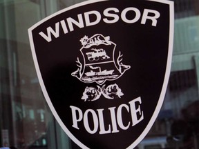 The Windsor Police Service insignia on the public door of the downtown headquarters building.