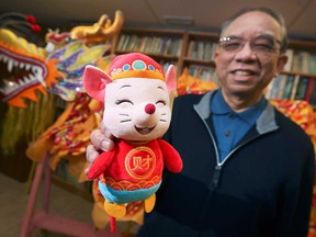 Stephen Tsui, president of the Essex County Chinese Canadian Association, holds a decorative doll celebrating the Year of the Rat. Photographed Jan. 22, 2020. The ECCCA will hold Chinese New Year demonstrations and displays at the Devonshire Mall on Sunday, Jan. 26.
