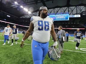 Damon Harrison of the Detroit Lions walks off the field after a 35-27 loss to the Dallas Cowboys at Ford Field on November 17, 2019 in Detroit, Michigan.